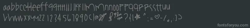 Youamazeme-fontti – harmaat kirjasimet mustalla taustalla