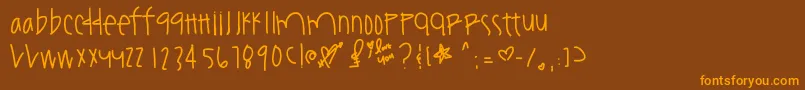 フォントYouamazeme – オレンジ色の文字が茶色の背景にあります。