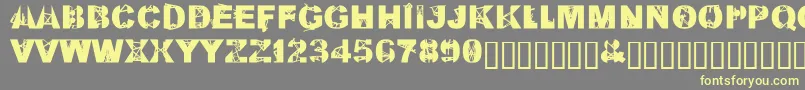 KillAllFontsJustAggression Font – Yellow Fonts on Gray Background