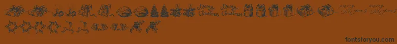 ChristmasNativityTfb-Schriftart – Schwarze Schriften auf braunem Hintergrund