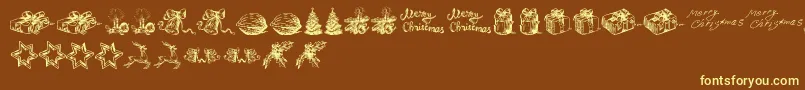 ChristmasNativityTfb-Schriftart – Gelbe Schriften auf braunem Hintergrund