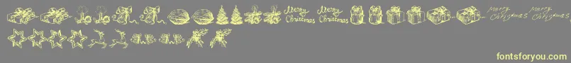 ChristmasNativityTfb-Schriftart – Gelbe Schriften auf grauem Hintergrund