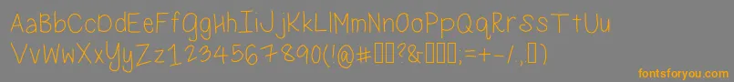 フォントMissMonkey – オレンジの文字は灰色の背景にあります。