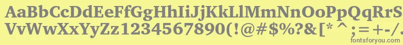 フォントCharterblackc – 黄色の背景に灰色の文字