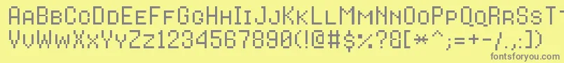8bitoperatorplusscRegular Font – Gray Fonts on Yellow Background