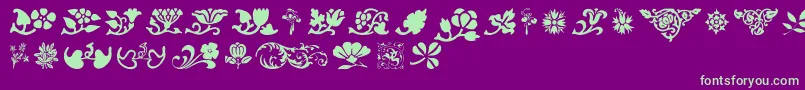 PrintersOrnamentsOne Font – Green Fonts on Purple Background