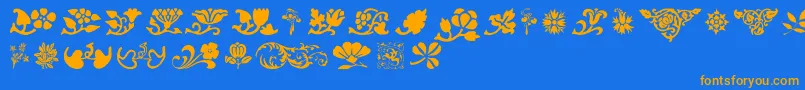 Шрифт PrintersOrnamentsOne – оранжевые шрифты на синем фоне