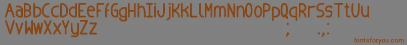 Czcionka BadopusTfb – brązowe czcionki na szarym tle