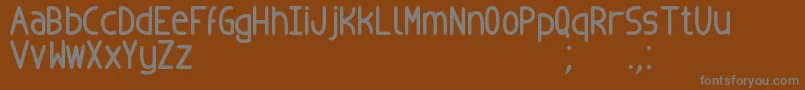 Шрифт BadopusTfb – серые шрифты на коричневом фоне