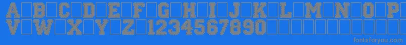 フォントStitchnSchool – 青い背景に灰色の文字