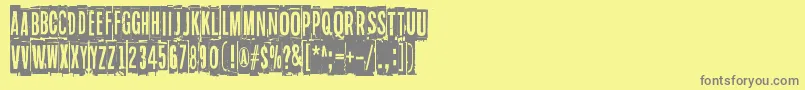 Blockheads Font – Gray Fonts on Yellow Background