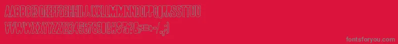 Pollux9401-Schriftart – Graue Schriften auf rotem Hintergrund