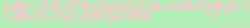 フォントKorupssi – 緑の背景にピンクのフォント