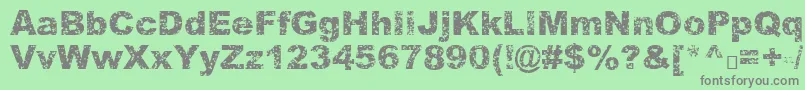 フォントQuasart – 緑の背景に灰色の文字