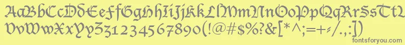Blecklet-fontti – harmaat kirjasimet keltaisella taustalla