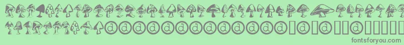 フォントShrooms ffy – 緑の背景に灰色の文字