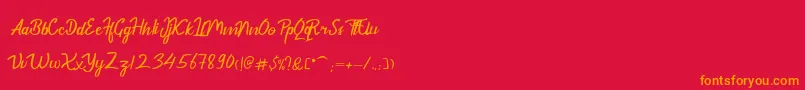 フォントDekadePersonalUse – 赤い背景にオレンジの文字