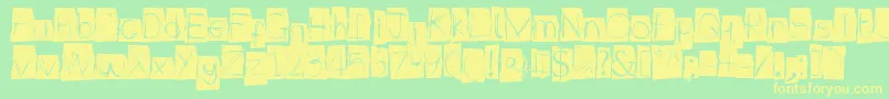 フォントIlluminate – 黄色の文字が緑の背景にあります