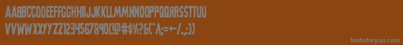 フォントGrimghostcond – 茶色の背景に灰色の文字