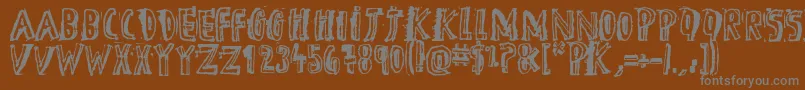 フォントDTheHero – 茶色の背景に灰色の文字