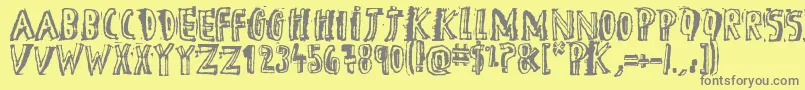 フォントDTheHero – 黄色の背景に灰色の文字