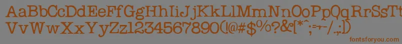 フォントProblemSecretaryNormal – 茶色の文字が灰色の背景にあります。