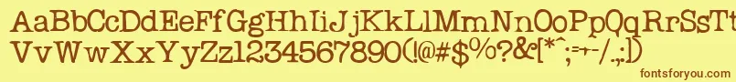 フォントProblemSecretaryNormal – 茶色の文字が黄色の背景にあります。