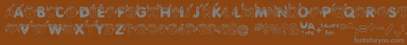 Edbindia Font – Gray Fonts on Brown Background