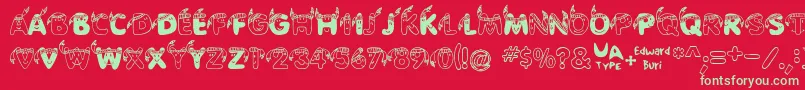 Edbindia-Schriftart – Grüne Schriften auf rotem Hintergrund