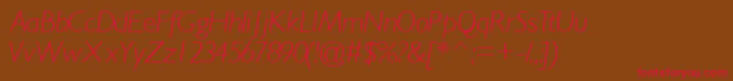 フォントGimletlightsskItalic – 赤い文字が茶色の背景にあります。