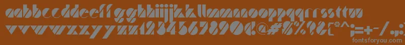 Traffic-fontti – harmaat kirjasimet ruskealla taustalla