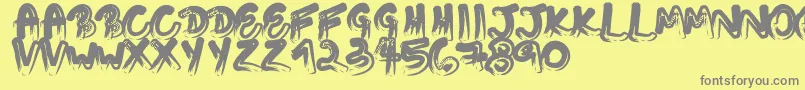 Touchingletters Font – Gray Fonts on Yellow Background