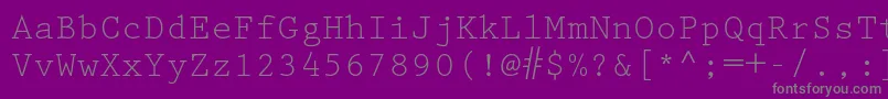Prestigeelitestd-fontti – harmaat kirjasimet violetilla taustalla