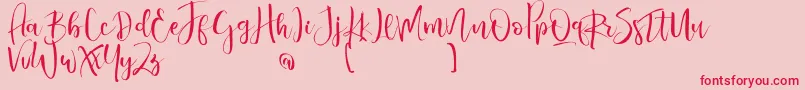 ValairyaPersonalUse-Schriftart – Rote Schriften auf rosa Hintergrund