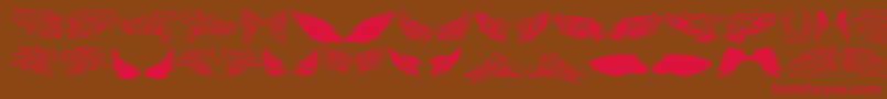 WingsOfWindTfb-Schriftart – Rote Schriften auf braunem Hintergrund