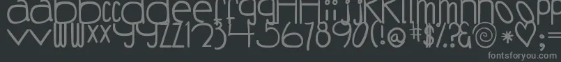 DjbCoffeeShoppeBuzzed-fontti – harmaat kirjasimet mustalla taustalla