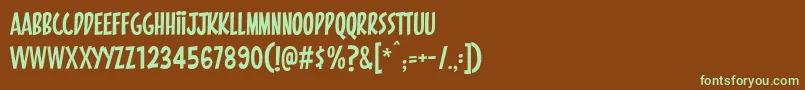 フォントPintanina – 緑色の文字が茶色の背景にあります。