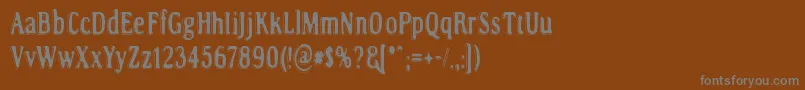 RoadToNowhere-fontti – harmaat kirjasimet ruskealla taustalla