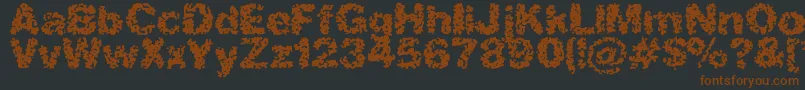 SpasticBrk Font – Brown Fonts on Black Background