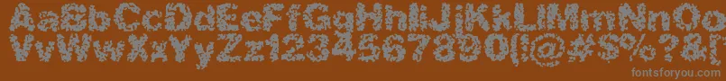 SpasticBrk Font – Gray Fonts on Brown Background