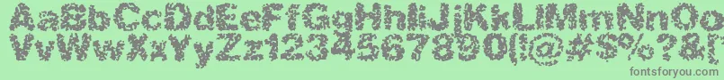 SpasticBrk Font – Gray Fonts on Green Background