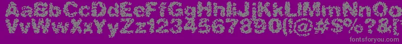 フォントSpasticBrk – 紫の背景に灰色の文字