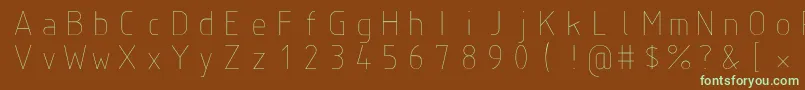 フォントIsoct – 緑色の文字が茶色の背景にあります。