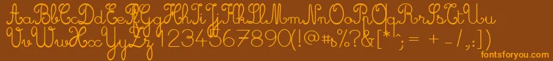 Cursive ffy Font – Orange Fonts on Brown Background