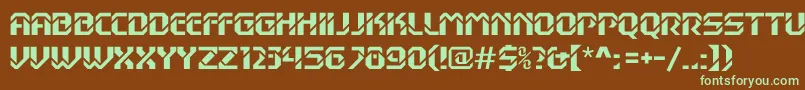 フォントDexterc – 緑色の文字が茶色の背景にあります。