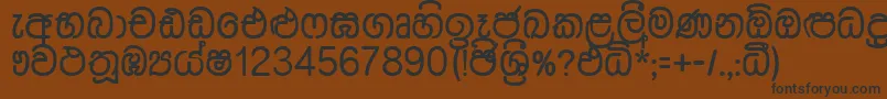 フォントDusharnbi – 黒い文字が茶色の背景にあります