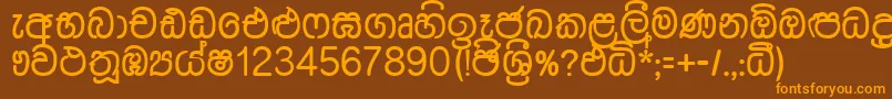 フォントDusharnbi – オレンジ色の文字が茶色の背景にあります。