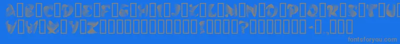 StilettoSilver-fontti – harmaat kirjasimet sinisellä taustalla