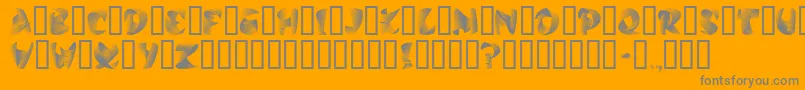 StilettoSilver-fontti – harmaat kirjasimet oranssilla taustalla