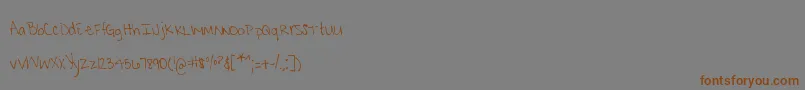 MtfKrystyna Font – Brown Fonts on Gray Background